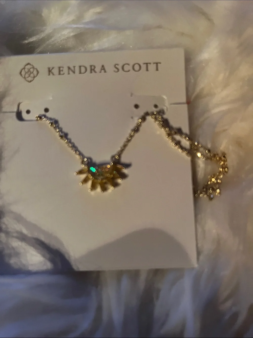 Kendra Scott Gold Sunburst Necklace with Iridescent Green Stone